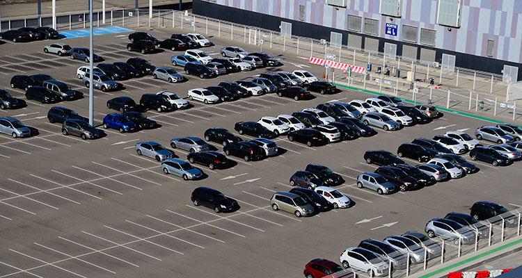 Injuries in Parking Lots: Who’s Liable for Your Fall or Crash?